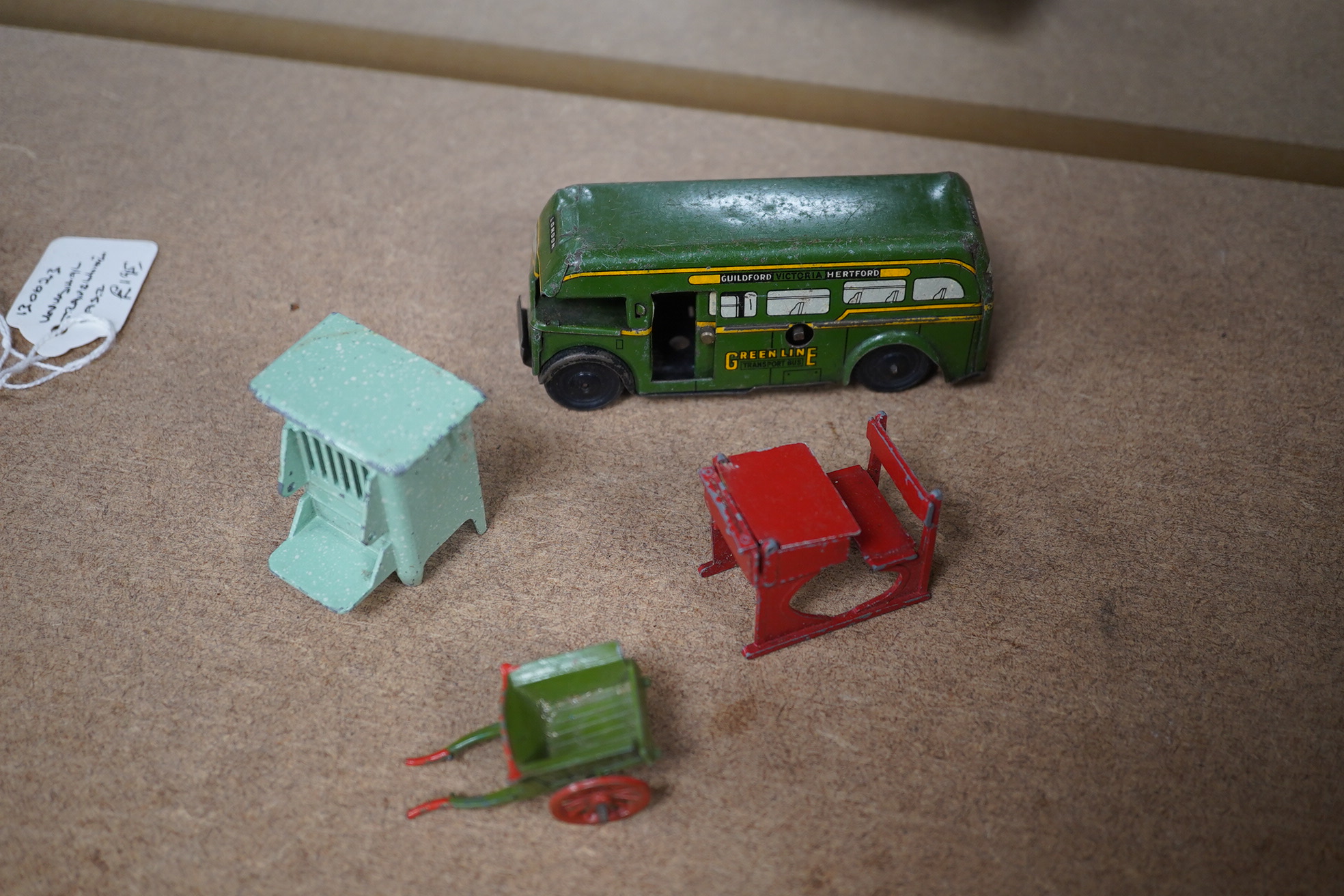 A group of various tinplate and other toys including Britains and Dinky and a 20th century straw filled dog. Condition - poor to fair